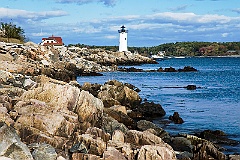 Portsmouth Harbor Lighthouse Guiding Boats From Rocky Shore